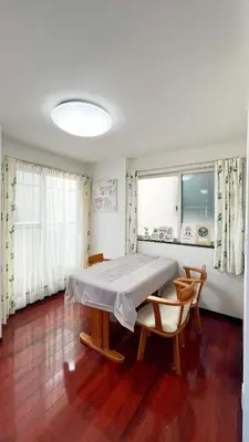 a dining room with a table and two chairs at JING HOUSE Shintakasago - Vacation STAY 17117 in Tokyo