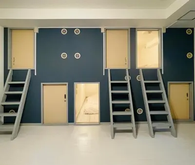 a room with three bunk beds and a bed at Space Noa201 in Tokyo