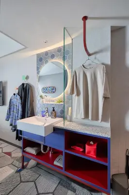 a dressing room with a sink and a mirror at lyf Shibuya Tokyo in Tokyo