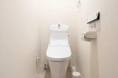 a bathroom with a white toilet in a stall at Ruygo\u65b0\u5bbf\u897f\u843d\u5408 in Tokyo