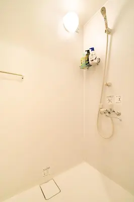 a bathroom with a shower and a sink at 63, Shiomi, First floor of the apartment, \u6f6e\u898b1F in Tokyo