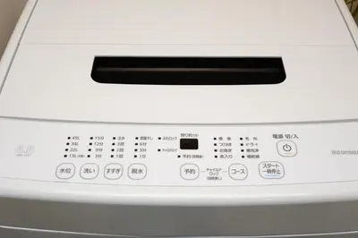 a close up of a washing machine with a control panel at Asakusa Landing - \u96f7\u9580\u3084\u6d45\u8349\u5bfa\u307e\u3067\u5f92\u6b69\u570f\u5185 - \u7121\u6599Wi-Fi\u3084\u30d7\u30ed\u30b8\u30a7\u30af\u30bf\u30fc\u5b8c\u5099 in Tokyo