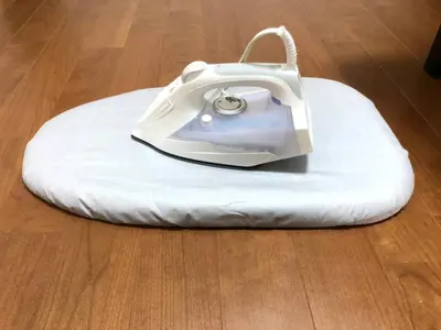a white purse sitting on top of a white pillow at 79, Umejima, Entire house for rent, \u6885\u5cf6 in Tokyo