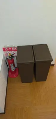 two trash cans sitting on the floor in a room at 79, Umejima, Entire house for rent, \u6885\u5cf6 in Tokyo
