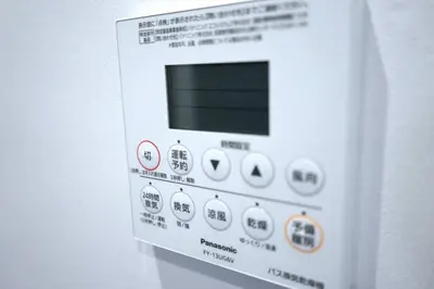a close up of a white microwave with buttons at Private Hotel Asakusa in Tokyo