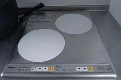 two white disks sitting on top of a scale at Private Hotel Asakusa in Tokyo