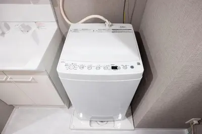 a white toilet in a small bathroom at Arucia\u4e09\u8ed2\u8336\u5c4b in Tokyo