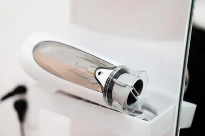 a close up of a hairdryer in a mirror at テルヌファビュル亀戸 - Tokyo Urban APT in a Japanese Local Shopping Street, with Direct Access to Shinjuku & Akihabara in Tokyo