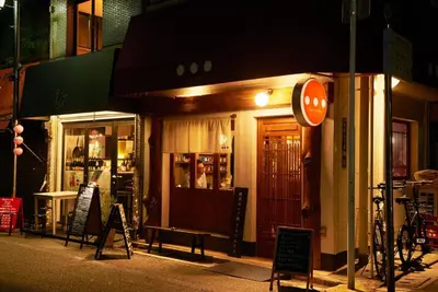 a shop with a sign in front of it at night at \u5bcc\u58eb\u306e\u9593 401 in Tokyo