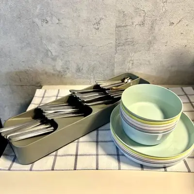a tray with a bowl and plates on a table at ペットと泊まれる Tatami & B 池上 202 2DK 40m2 in Tokyo