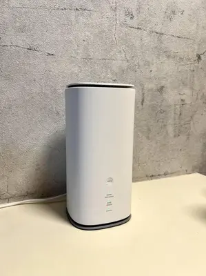a white cup sitting on a table next to a wall at ペットと泊まれる Tatami & B 池上 202 2DK 40m2 in Tokyo
