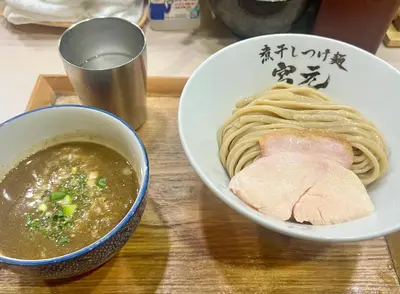 a bowl of noodles and a bowl of soup on a table at ペットと泊まれる Tatami & B 池上 202 2DK 40m2 in Tokyo