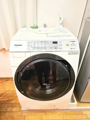a white washing machine with its door open at \u834f\u539f\u4e2d\u5ef6\u99c5\u304b\u30893\u5206,\u5e83\u3005LDK,\u8cb8\u5207,\u54c1\u5ddd\u99c5\u307e\u306720\u5206,comfortable in Tokyo
