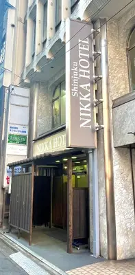 a nikka hotel sign on the side of a building at \u65b0\u5bbf\u30cb\u30c3\u30ab\u30db\u30c6\u30eb in Tokyo
