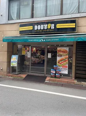 a dunkin donuts store on the side of a building at \u30cf\u30a4\u30af\u30ec\u30b9\u30c8\u4e2d\u91ce201 in Tokyo