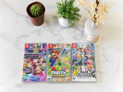 three video games on a table with a plant at Kosuge Sta 6min walk Ueno Sta 10min Switch in Tokyo