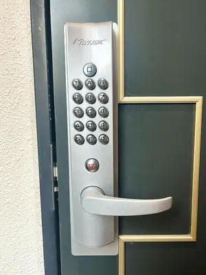a door with a remote control on it at SF Heigths in Tokyo