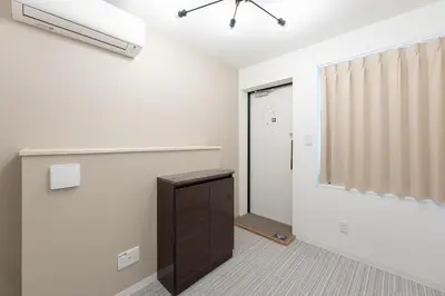 an empty room with a closet and a door at LaVie\u56db\u8c37 in Tokyo