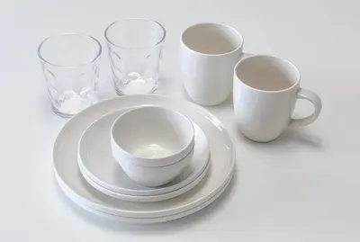 three cups and a plate and three glasses at \u65b0\u5927\u585a\u6238\u5efa\u3066 in Tokyo