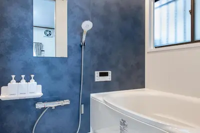 a bathroom with a shower and a tub and a sink at \u65b0\u5927\u585a\u6238\u5efa\u3066 in Tokyo