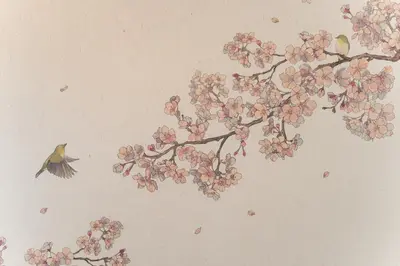 a bird on a branch of aakura tree with a bird flying at Omotenashi HOTEL Asakusa in Tokyo