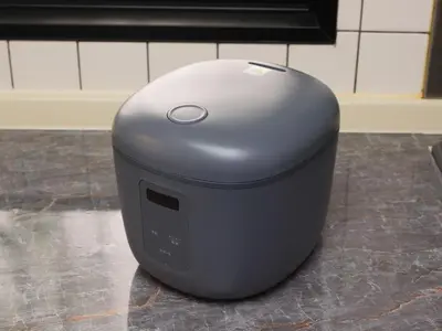 a grey object sitting on the floor in a kitchen at Comfort HASUNUMA in Tokyo