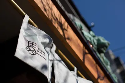 a bag of chips hanging on the side of a building at Bamba Hotel Tokyo-Private Townhouse- in Tokyo