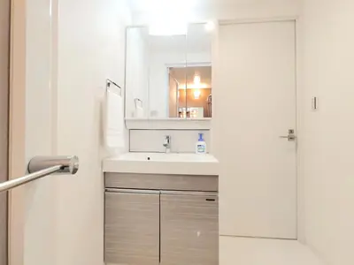 a bathroom with a sink and a mirror at LANG - Vacation STAY 22195v in Tokyo