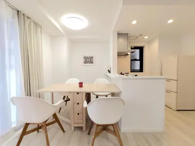 a kitchen and dining room with a table and chairs at LANG - Vacation STAY 22184v in Tokyo