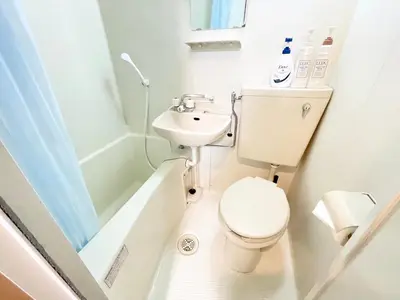 a small bathroom with a toilet and a sink at \u30b7\u30e3\u30f3\u30c6\u9ad8\u7530\u99ac\u583412 in Tokyo