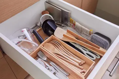a drawer filled with utensils in a kitchen at HATa in Tokyo