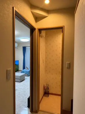 an open door to a room with a living room at Lapis House 201 - 2F in Tokyo