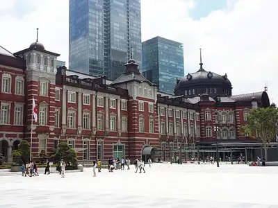 a large brick building with people walking in front of it at Lapis House 201 - 3F in Tokyo
