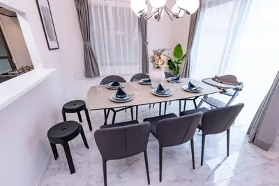 a dining room with a table and chairs at HOETL GOLD TOKYO - Vacation STAY 45153v in Tokyo