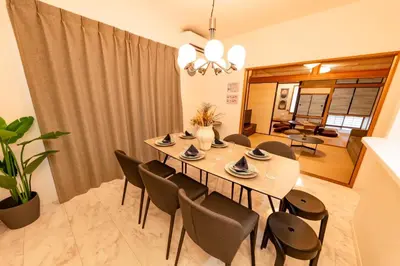 a dining room with a table and chairs at HOETL GOLD TOKYO - Vacation STAY 45153v in Tokyo