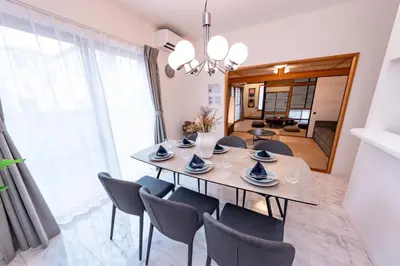 a dining room with a table and chairs at HOETL GOLD TOKYO - Vacation STAY 45153v in Tokyo