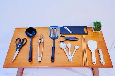 a wooden table with utensils on top of it at Nordic-Retreat Inn in Tokyo