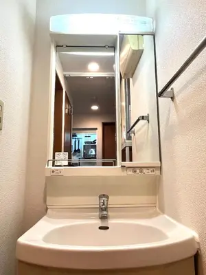 a bathroom with a sink and a mirror at S,F, Heights - Vacation STAY 17170 in Tokyo