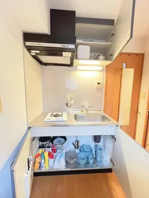 a small kitchen with a sink and a counter top at Amika First203 AF23 in Tokyo