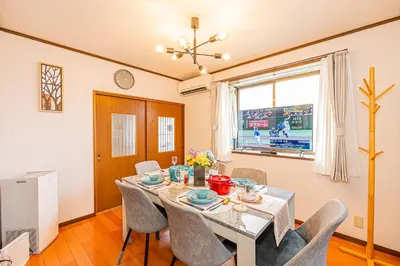 a dining room with a table and chairs at Asakusa-Ginza-Skytree-Stn-4min-95sqm-Garage-2WC-2Swr in Tokyo