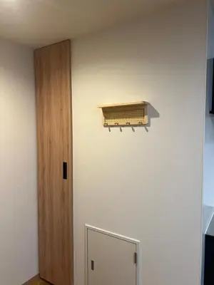 a room with a white wall with a air vent at the one ueno in Tokyo