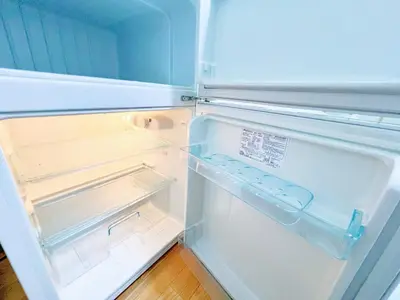 an empty refrigerator with its door open with its door open at \u897f\u6b66\u65b0\u5bbf\u7dda \u99c5\u8fd16\u4eba\u53ef d1 in Tokyo