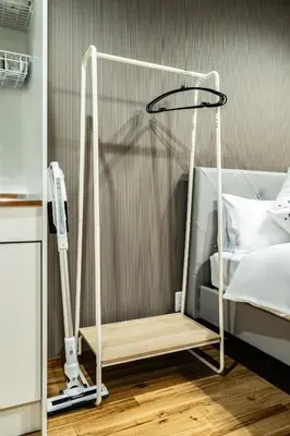 a bedroom with a bunk bed with a white bed frame at 74, Yotsugi, Entire house for rent, \u56db\u3064\u6728 in Tokyo