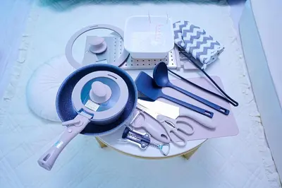 a pile of kitchen utensils sitting on a table at #40 -Siro House- \u5800\u5207 in Tokyo