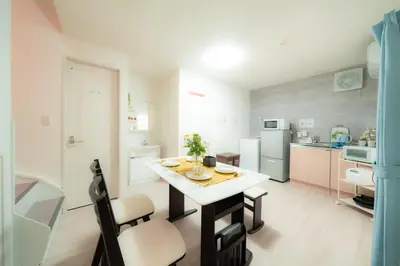 a kitchen with a table and a dining room at 20, Hikifune, Entire house for rent, \u66f3\u821f in Tokyo