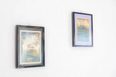 two framed pictures of palm trees on a wall at 20, Hikifune, Entire house for rent, \u66f3\u821f in Tokyo