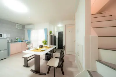 a kitchen and dining room with a table and chairs at 20, Hikifune, Entire house for rent, \u66f3\u821f in Tokyo
