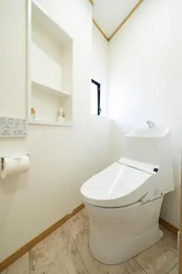 a white bathroom with a toilet and a mirror at 38, Kyojima 3, Entire house for rent, \u4eac\u5cf63\u4e01\u76ee in Tokyo