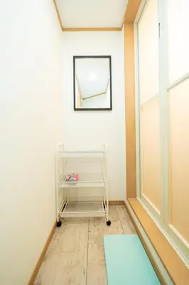 a hallway with a cart in a room with a window at 38, Kyojima 3, Entire house for rent, \u4eac\u5cf63\u4e01\u76ee in Tokyo