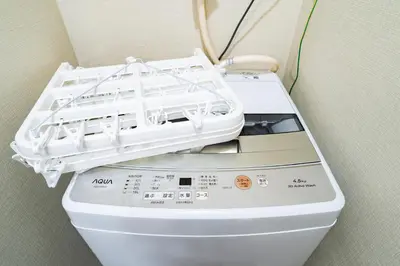 a washing machine with a lid on top of it at 72, Nakanobu A, Entire house for rent, \u4e2d\u5ef6A in Tokyo